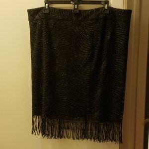 Short, black skirt with fringed. Size 16